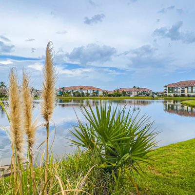 Condominiums and lake view at Three Fountains of Viera Condominiums in Melbourne, Florida